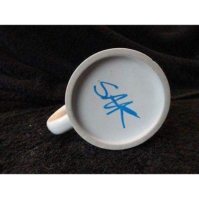 coffee mug signed by  Steve Kaufman A Mug for All Seasons