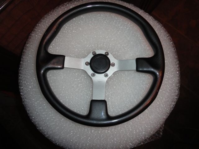 Gussi Boat Steering Wheel – Black Carbon Look with Brushed Spoke & Polished Hub Adapter