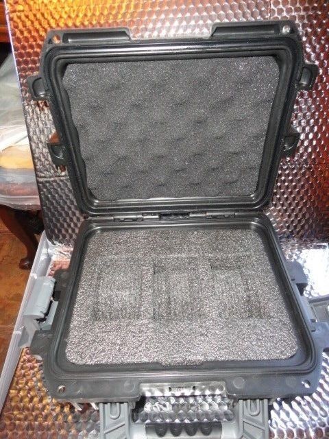 Invicta watch carrying case in black with grey handles holds 3 watches