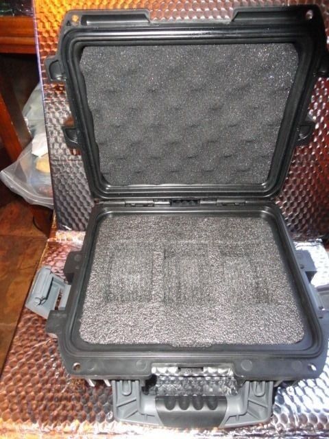 Invicta watch carrying case in black with grey handles holds 3 watches