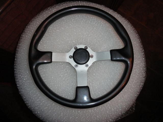 Gussi Boat Steering Wheel – Black Carbon Look with Brushed Spoke & Polished Hub Adapter