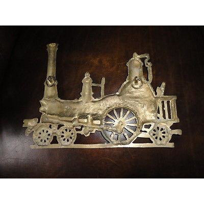 brass locomotive wall hanging